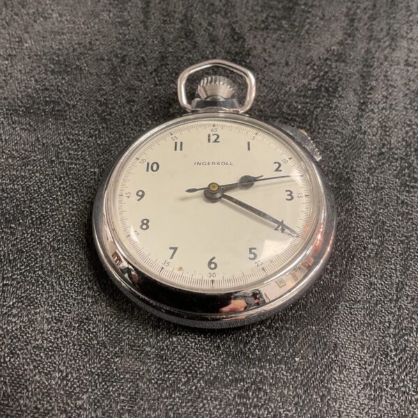 Vintage Ingersoll pocket watch with stopwatch function, detailed view.