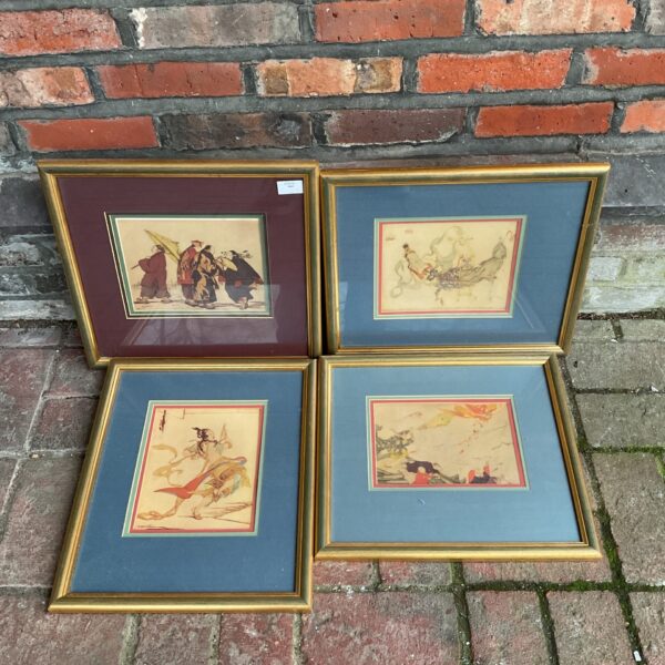 Framed vintage Japanese woodblock print with detailed figures.