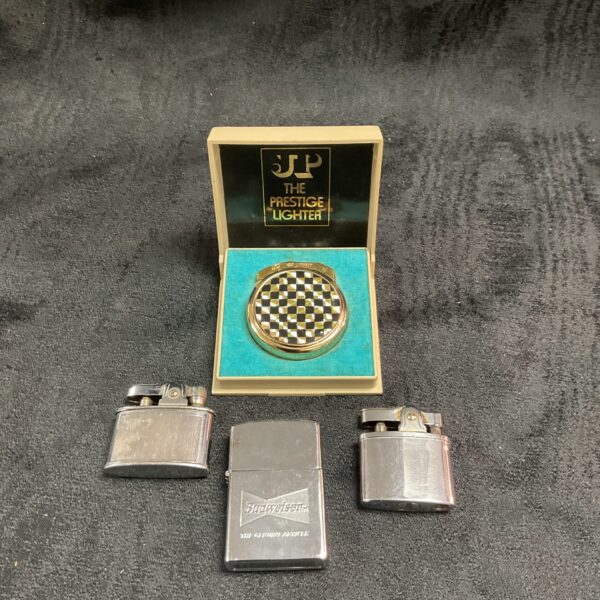 Vintage JP Prestige lighter with Budweiser fliptop, collectible lighters.