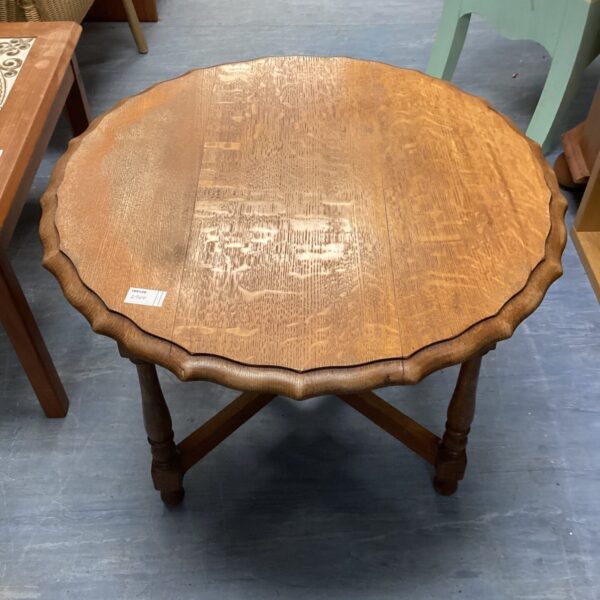Vintage mahogany pie top side table with tripod legs.
