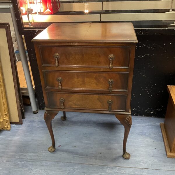 Vintage mahogany three drawer cabinet with cabriole legs.