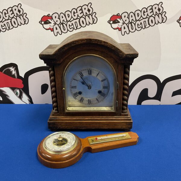 Vintage oak mantle clock and Shortland barometer set on display.