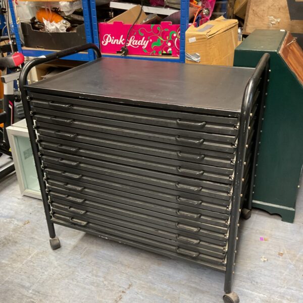 Vintage metal map drawers with ten drawers for blueprint storage.