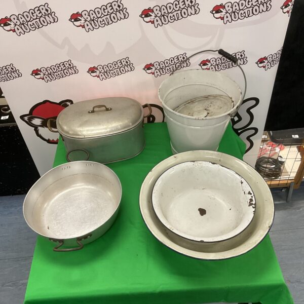 Vintage metal kitchen lot with bowls, pan, and Phoenix Brand tin.