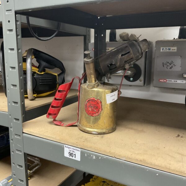 Vintage Monitor brass blowtorch with red handle.
