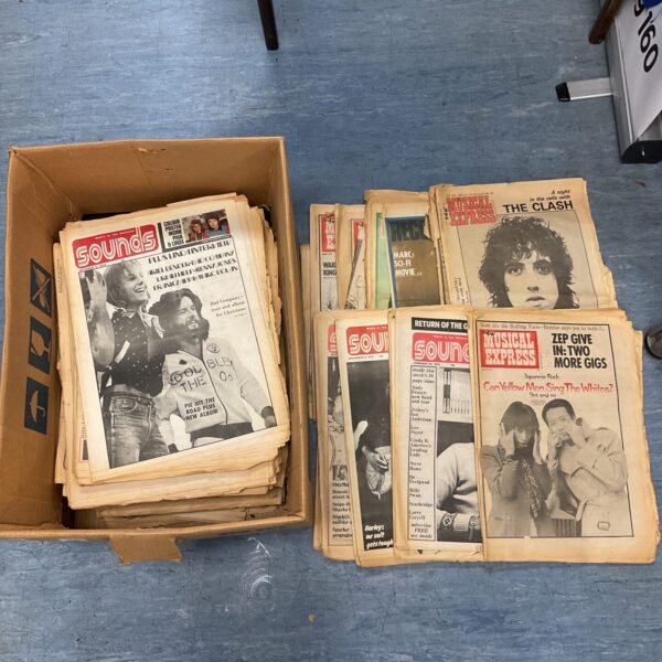 Large collection of vintage music newspapers, including Sounds and NME.
