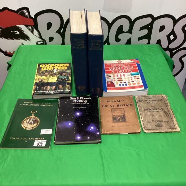 Vintage Oxford dictionary and medical guide book collection.