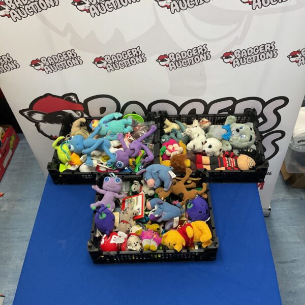 Vintage plush lot featuring McDonald's and Disney toys.