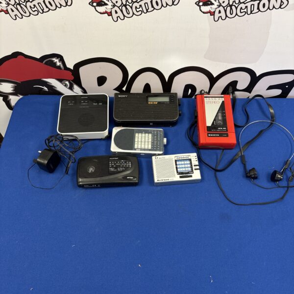 Vintage portable radios and cassette players from Sony and Roberts.