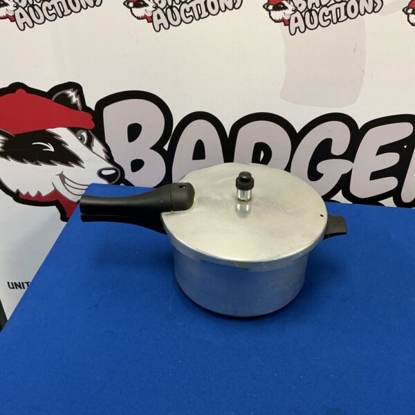 Vintage Prestige pressure cooker in aluminium, classic kitchenware.