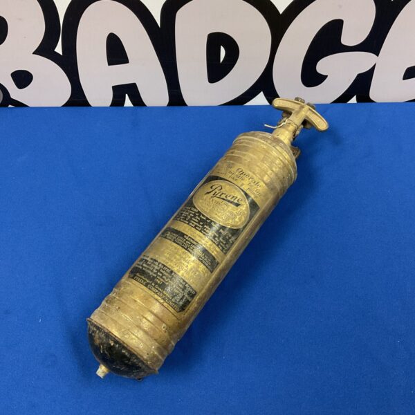 Vintage brass Pyrene fire extinguisher for classic cars.
