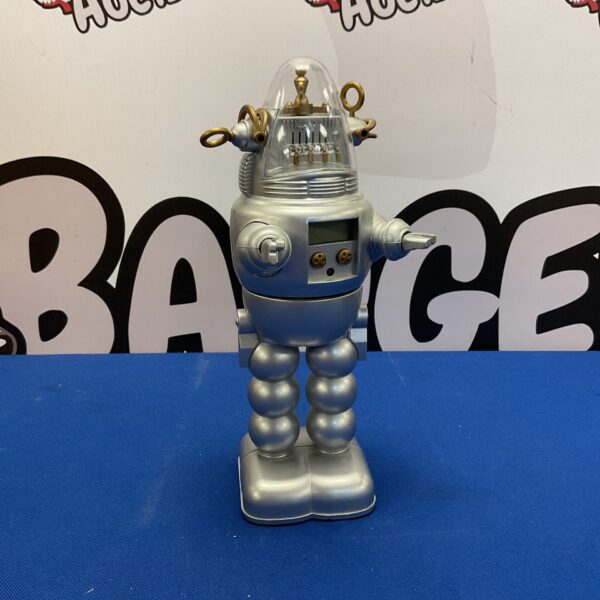 Silver vintage robot toy from the 1950s, collectible space toy.