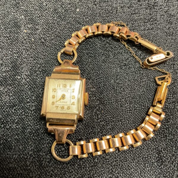 Vintage rolled gold ladies wristwatch with square case.