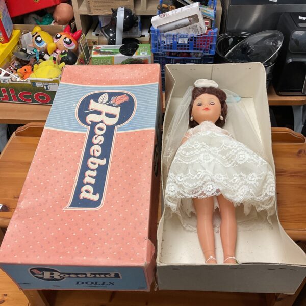 Vintage Rosebud doll presented in its original box.