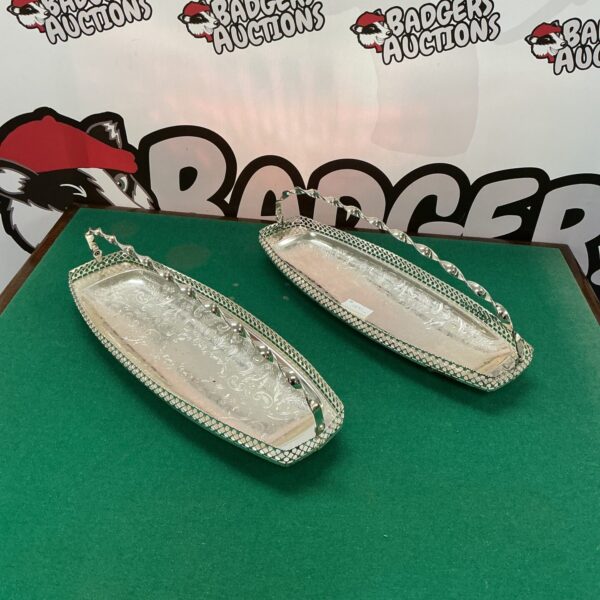 Vintage silverplate sandwich trays for serving refreshments.