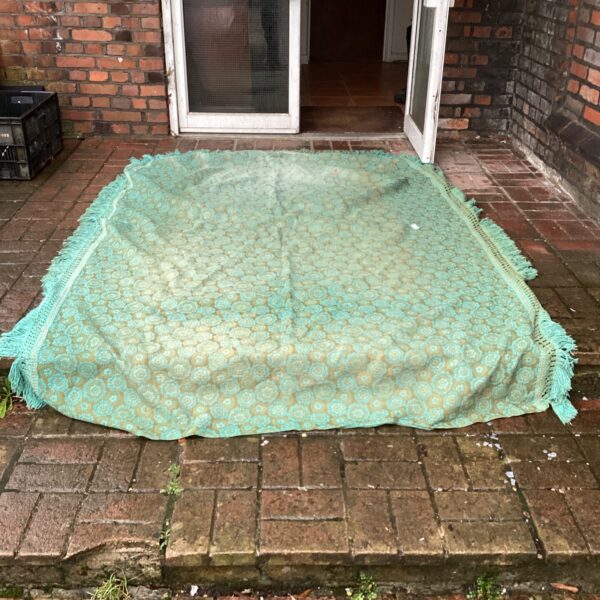 Vintage Sleep Master double bed throw with floral pattern.