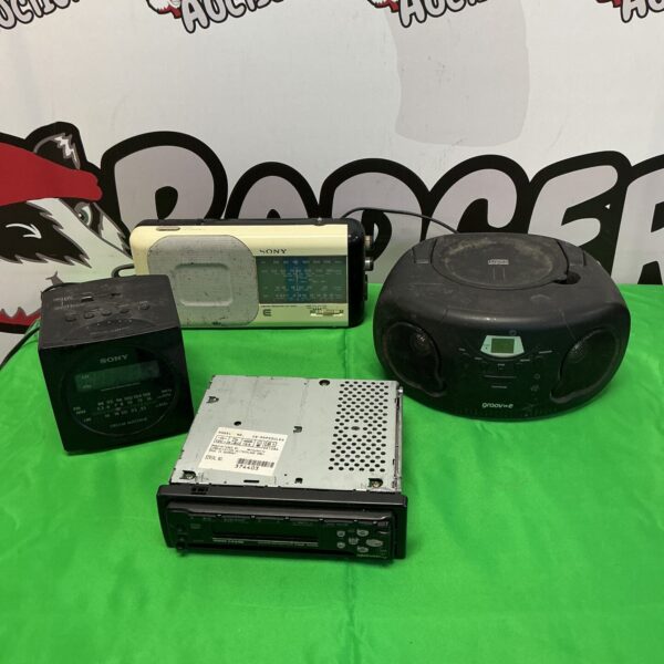 Vintage Sony radios and Panasonic RDP930 car stereo lot.
