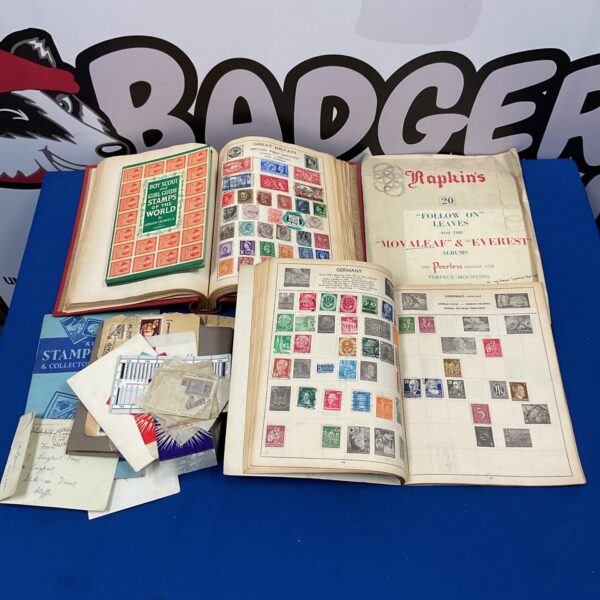 Vintage stamp collection albums filled with collectible stamps.