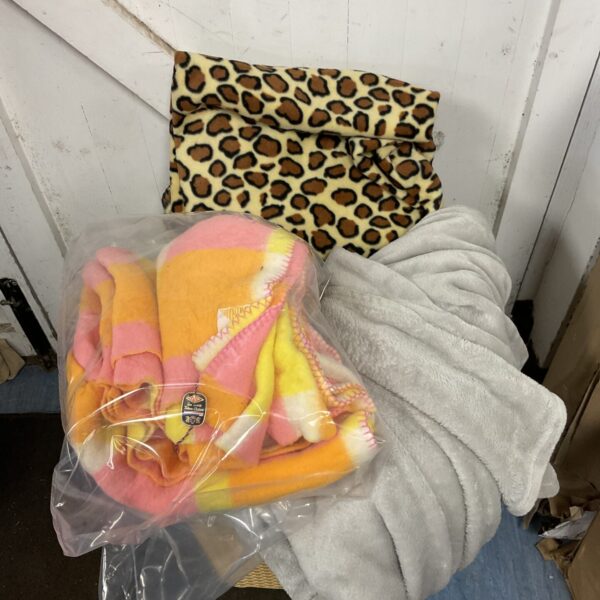 Colourful vintage Tetem blanket with knitted pattern.
