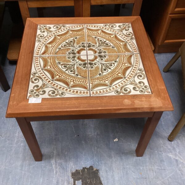Colourful vintage tile top side table with tapered legs.