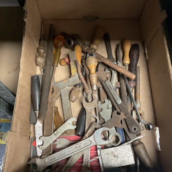 Vintage tool lot with wrenches, screwdrivers, and pliers.