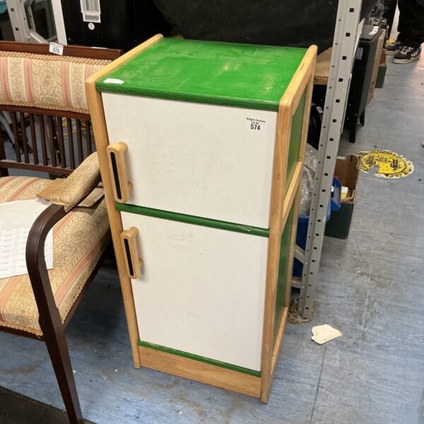 Vintage two-door cupboard with a painted finish, ideal for home storage.