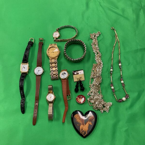 Vintage watch and jewellery lot featuring various necklaces and bracelets.