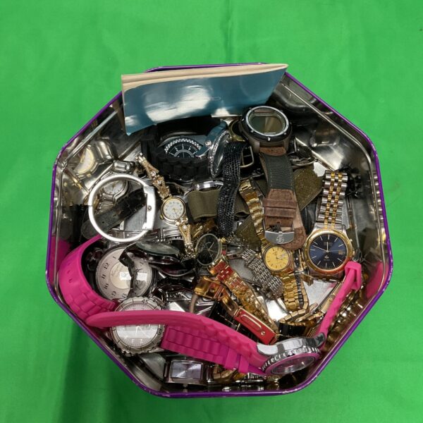 Vintage watch lot featuring Seiko and Timex wristwatches for collectors.