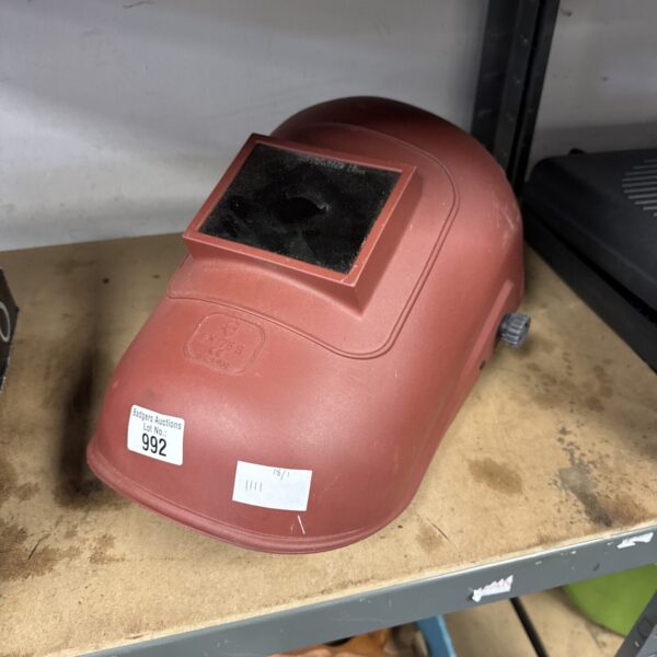 Vintage welders mask showing signs of wear and age.