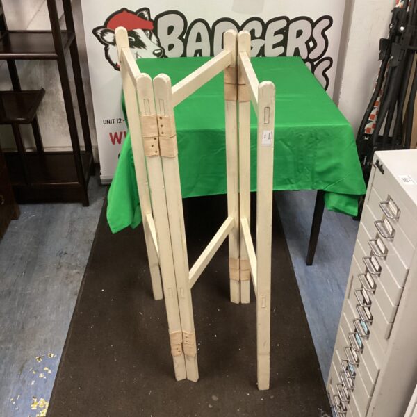 Vintage wooden clothes horse for drying laundry indoors.