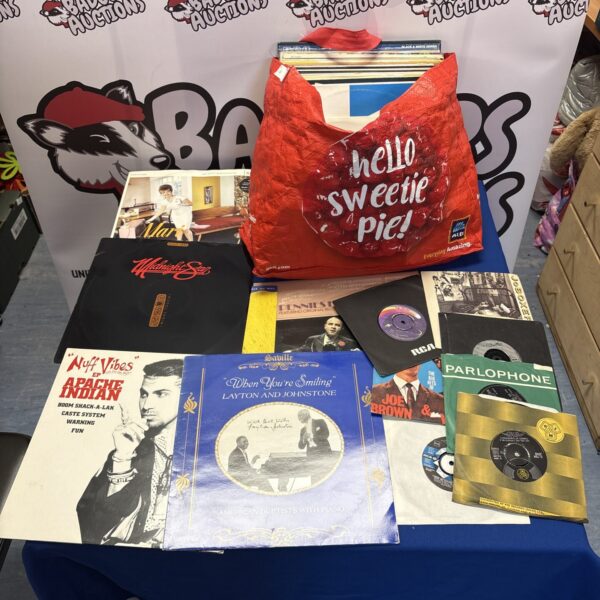 Mixed genre vinyl record lot for collectors and music lovers.