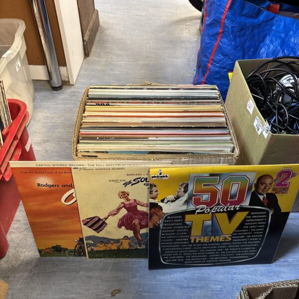 Mixed lot of twelve-inch vinyl records for collectors and enthusiasts.