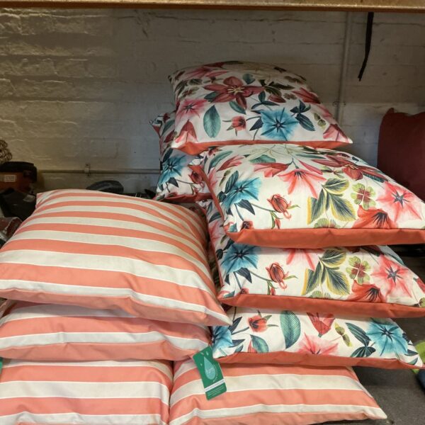 Vibrant floral waterproof garden cushions for outdoor patio furniture.
