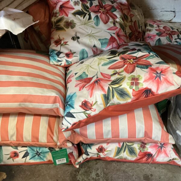 Vibrant floral waterproof garden cushions for outdoor seating.