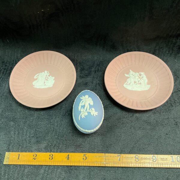 Wedgwood Jasperware pin dishes in pink and blue with neoclassical scenes.