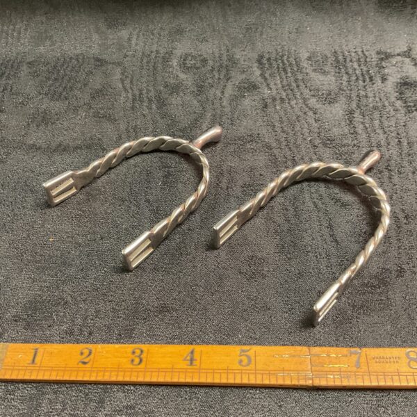 Antique white metal spurs, a pair for horse riding.