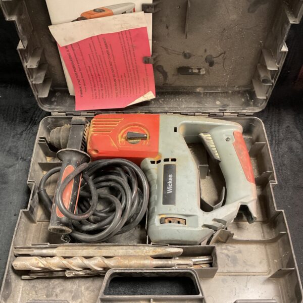 Vintage Wickes hammer drill in original carrying case.