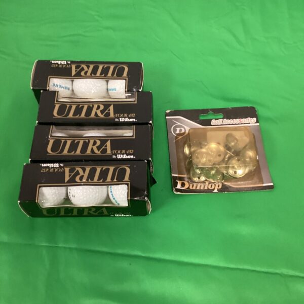 Wilson Ultra Tour 432 golf balls and Dunlop spikes lot for collectors.