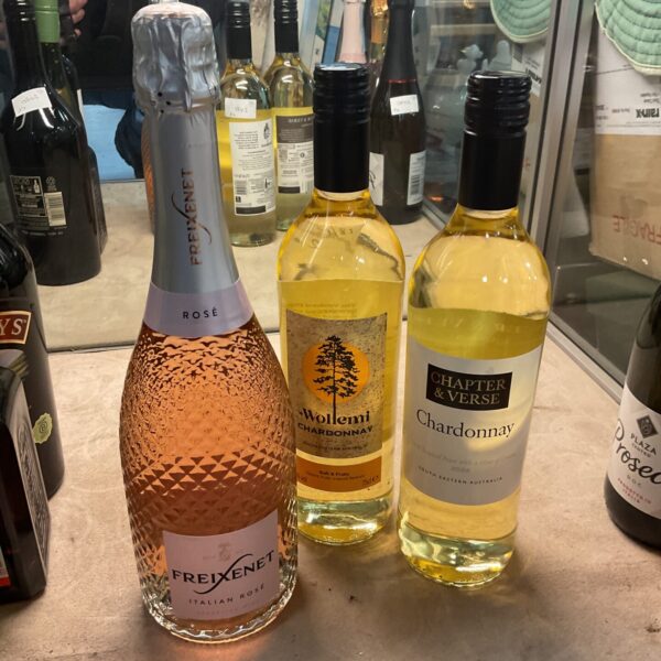 Wine lot featuring Chapter and Verse Chardonnay and Freixenet Rosé bottles.