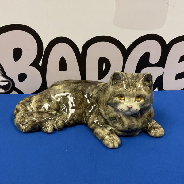 Vintage Winstanley cat ornament with glass eye.