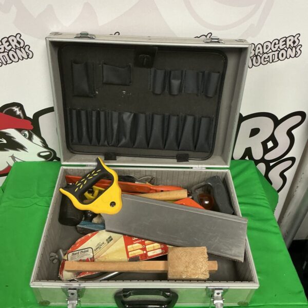 Vintage woodworking tool set in aluminium case with various hand tools.
