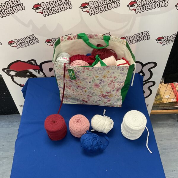 Assorted yarn and cotton ribbon lot for crafting projects.