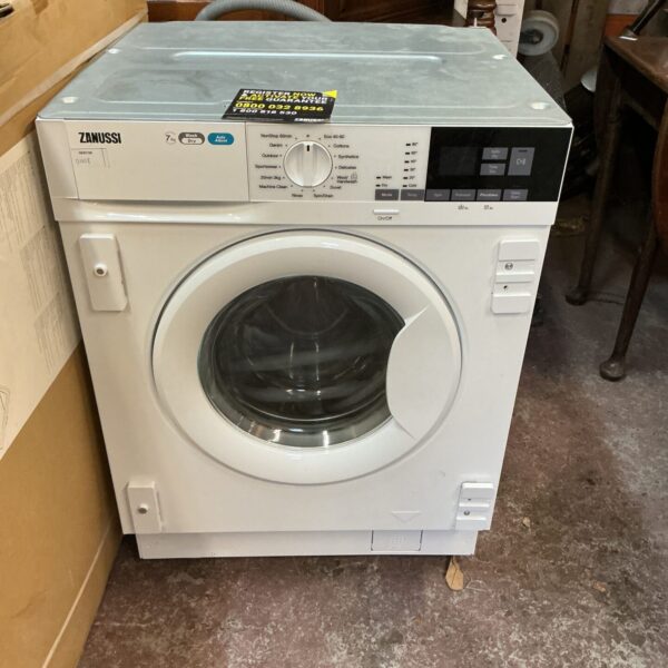 Front view of a white Zanussi 7kg washing machine.