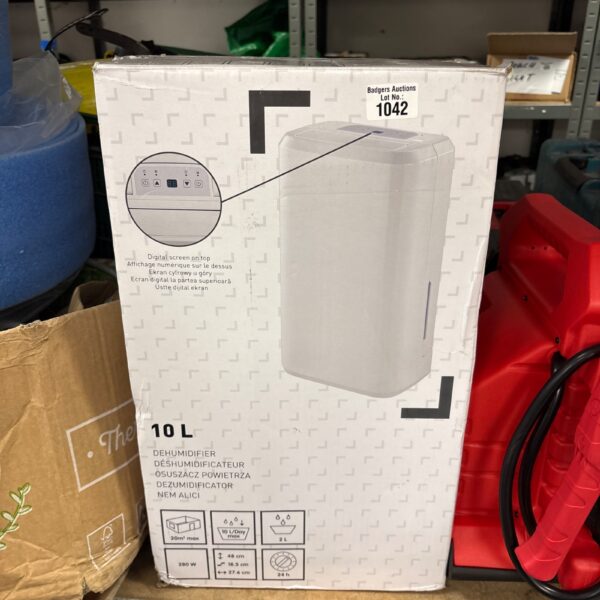 Unused 10L dehumidifier with digital display for moisture control.