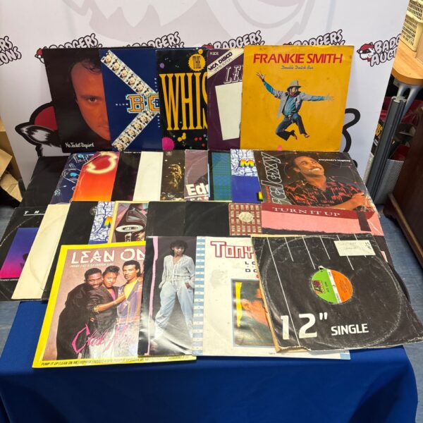 Mixed lot of 12 inch vinyl records including Phil Collins and Frankie Smith.