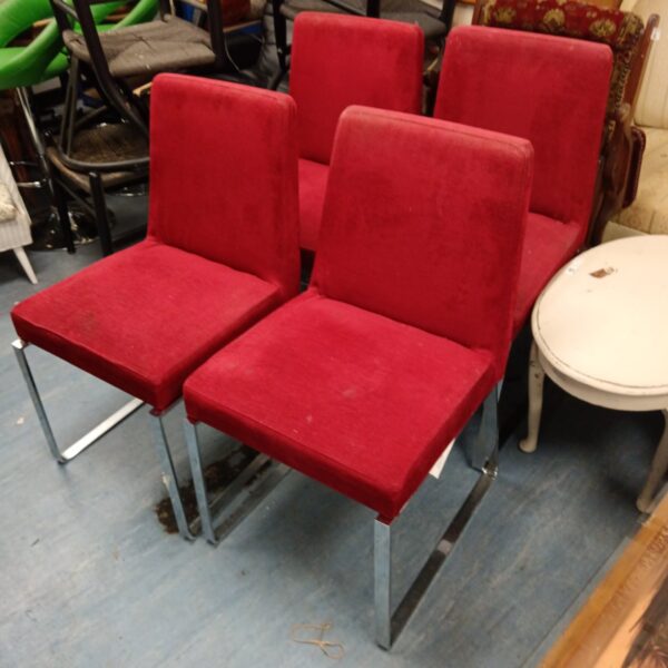 Four Italian calligaris designer chairs with heavy chrome frames & protective covers
