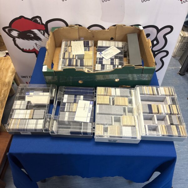Large collection of vintage 35mm projector slides for collectors.