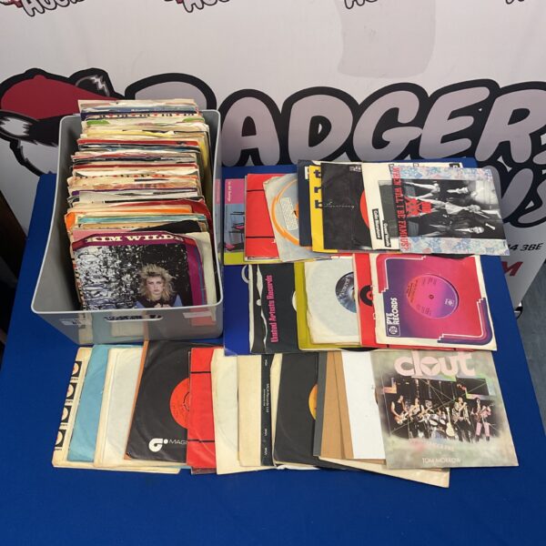 Vintage 7” vinyl singles collection featuring 1980s pop artists.