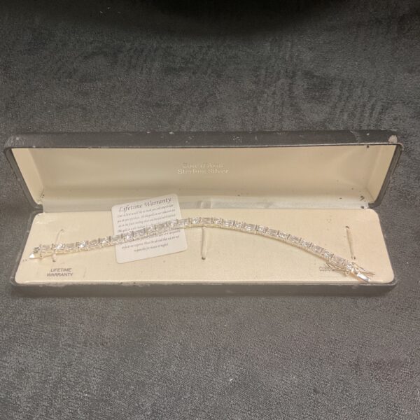 Silver bracelet with cubic zirconia stones, elegant fashion jewellery.