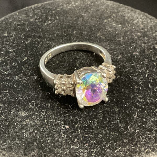 Vibrant 925 silver ring with rainbow cubic zirconia stone.